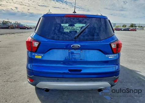 2019 Ford Escape Titanium z USA, uszkodzony, nr VIN 1FMCU9J99KUA73233
